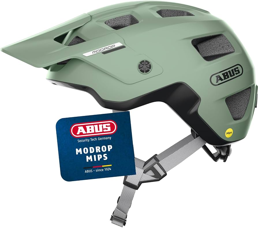 casco-mips-mtb-205xgi-1.jpg ABUS Casco MTB MoDrop MIPS para Adultos y Jóvenes, Verde, L | Casco de ciclismo con protección MIPS, sistema de ajuste Zoom Spin y apertura para coleta : Amazon.es: Deportes y aire - Imagen 1
