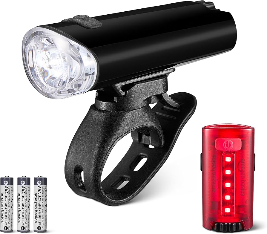 luces-de-bicicleta-493tbh-1.jpg Amazon Basics Set de Luces LED para Bicicleta con Faro 100 Lúmenes y Luz Trasera 10 - Imagen 1